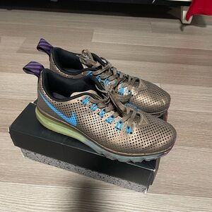 Nike Metallic Bronze Low-Top Sneakers with Blue Swoosh and Purple Pull Tabs